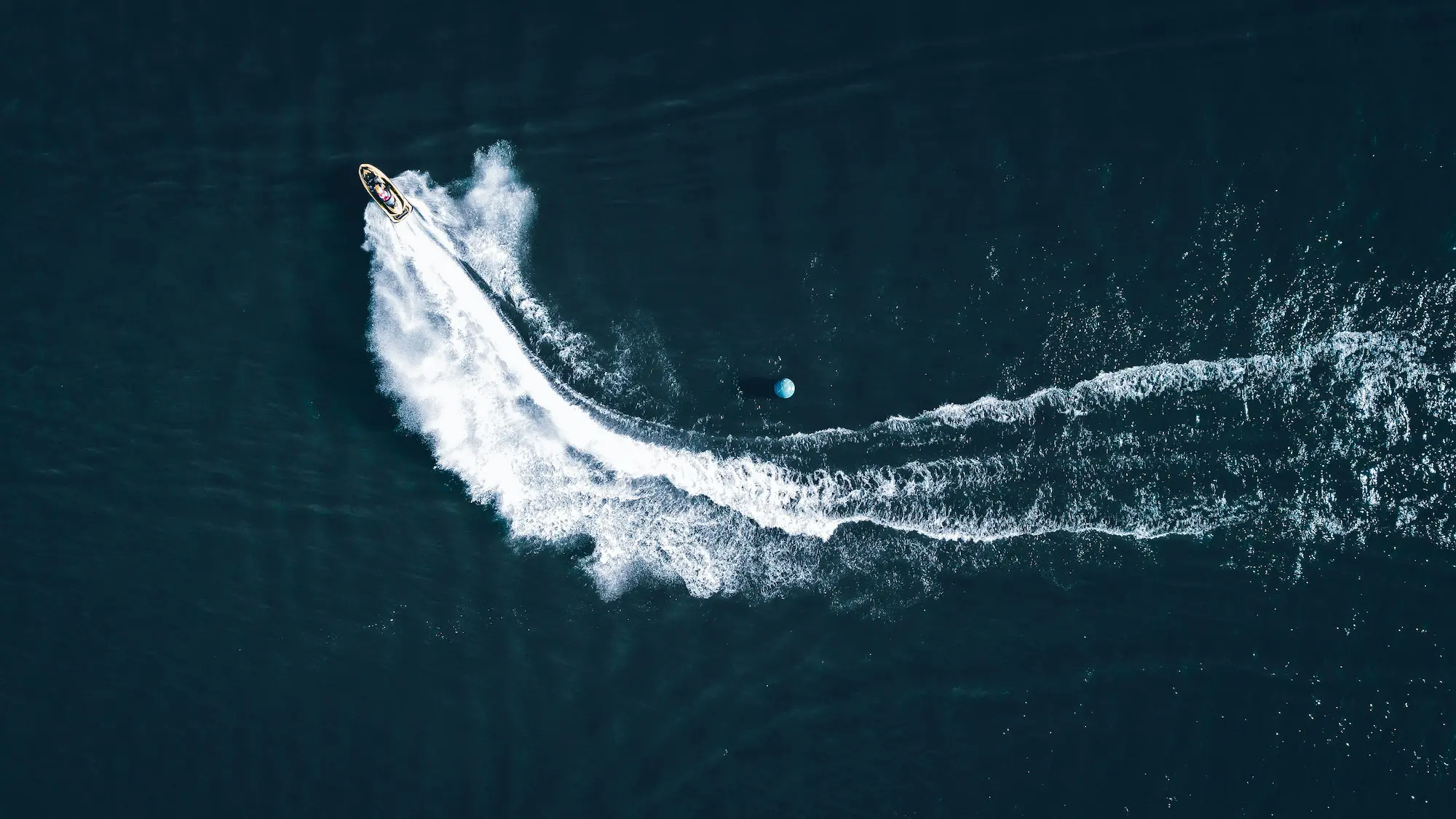 CTA — wide action shot, open water